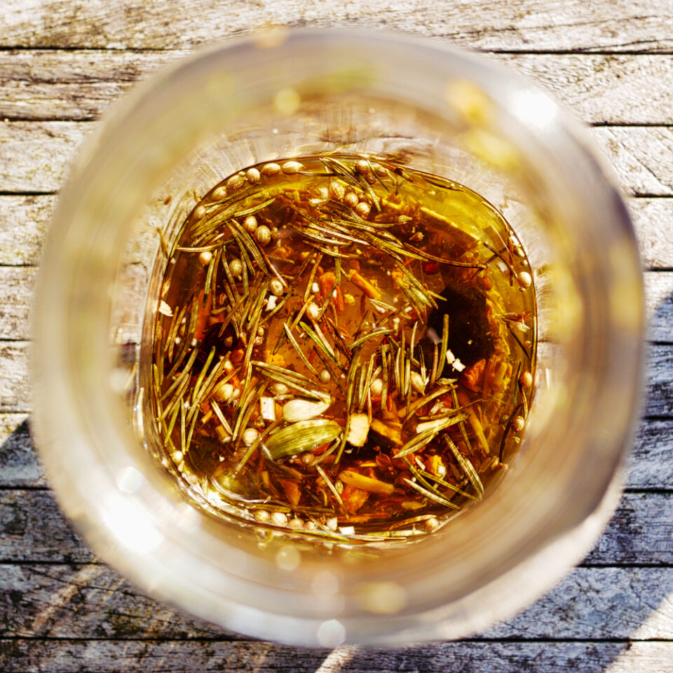 Herbs and roots infusing in alcohol